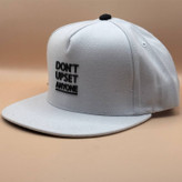کلاه کپ کره ای سفید مدل DONT UPSET ANYONE